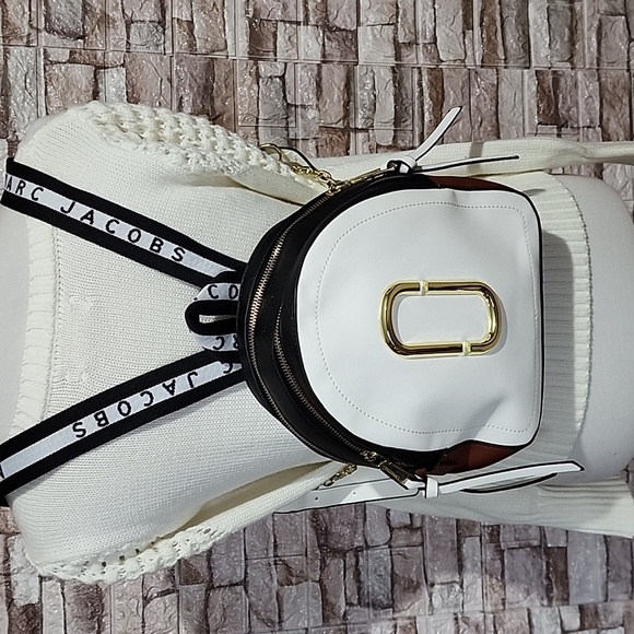 Marc Jacobs Handbags - Marc Jacobs White and Black Logo Strap Mini Backpack